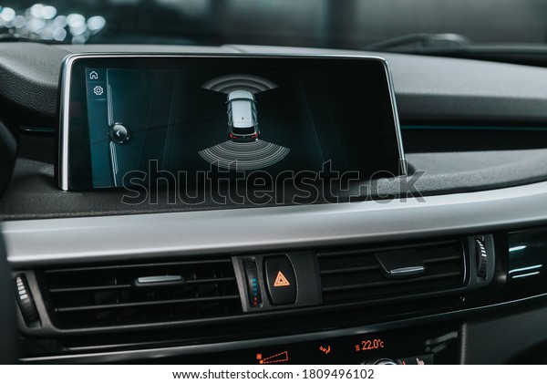 Novosibirsk, Russia – September 05, 2020:  BMW\
X5,  monitor for monitoring car parking with a large number of\
cameras and\
sonars\
