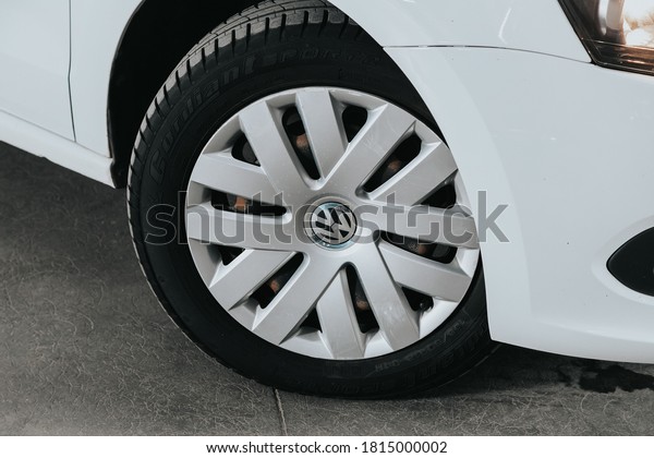 Novosibirsk, Russia – September 12, 2020 \
Volkswagen Polo, Car wheel with alloy wheel and new rubber on a car\
closeup. Wheel tuning\
disc\
