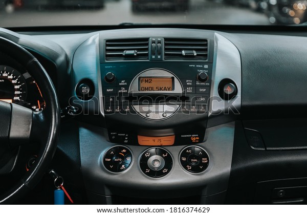 Novosibirsk, Russia –\
September 12, 2020: Toyota RAV-4 , close-up of the central control\
panel, monitor with music and radio , adjustment of the blower, air\
conditioner,\
player