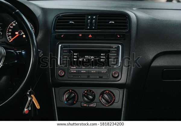 Novosibirsk, Russia –\
September 19, 2020: Volkswagen Polo, close-up of the central\
control panel, monitor with music and radio , adjustment of the\
blower, air conditioner,\
player