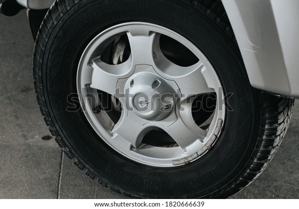 Novosibirsk, Russia – September 19, 2020: UAZ\
Patriot, Car wheel with alloy wheel and new rubber on a car\
closeup. Wheel tuning\
disc\
