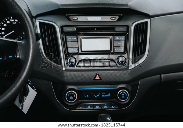 Novosibirsk, Russia – September 29, 2020:  \
Hyundai Creta, close-up of the central control panel, monitor with\
music and radio , adjustment of the blower, air conditioner,\
player. modern car\
interior\
