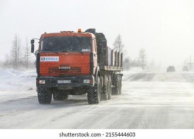 Novyy Urengoy, Russia - April 20, 2022: Semi-trailer Offroad Truck Kamaz 44108 In A City Street During A Strong Wind And Snowfall.