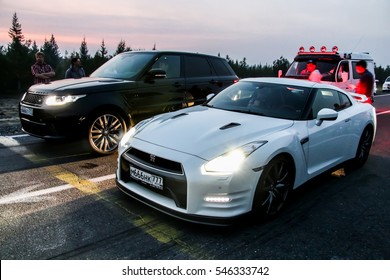 NOVYY URENGOY, RUSSIA - AUGUST 12, 2016: Motor Cars Range Rover Takes Part In The Night Street Drag Racing.