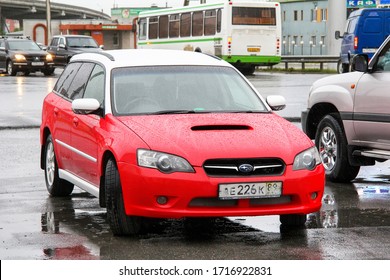 Novyy Urengoy, Russia - August 7, 2012: Bright red car Subaru Outback in the city street. - Shutterstock ID 1716922831