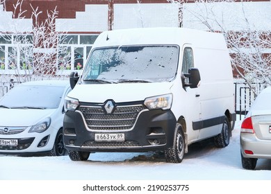 Novyy Urengoy, Russia - February 28, 2021: White Panel Van Renault Master Covered With Hoar Frost In The City Street.