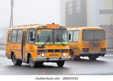 NOVYY URENGOY, RUSSIA - SEPTEMBER 19, 2012: Yellow PAZ 3205 school buses at the city street.