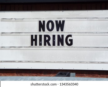 Now Hiring Sign Outdoors