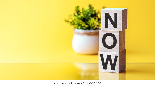NOW message on yellow background. Now made with building blocks. - Shutterstock ID 1757511446