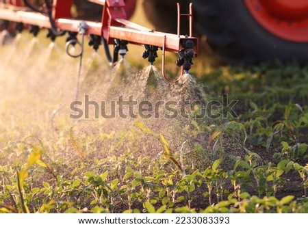 Nozzle of the tractor sprinklers sprayed.Soybean spraying.
