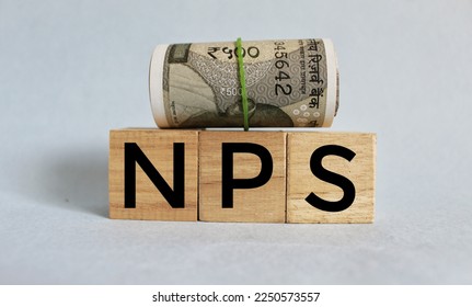 NPS or national pension scheme with wooden bids or blocks. 