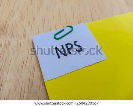 NPS writting on table background.