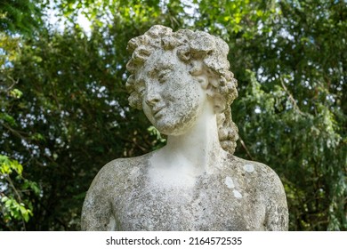 Nr. Wooler, Northumberland, UK: May 29th, 2022: Garden Statue At Lilburn Tower, A Mansion House Gardens Open Through The National Gardens Scheme.