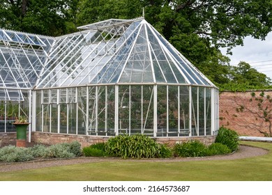 Nr. Wooler, Northumberland, UK: May 29th, 2022: Grand Glasshouse At Lilburn Tower, A Mansion House Gardens Open Through The National Gardens Scheme.