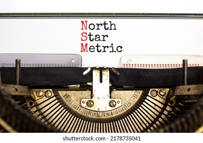 NSM North Star Metric Symbol. Concept Words NSM North Star Metric Typed On Old Retro Typewriter On A Beautiful White Background. Business And NSM North Star Metric Concept. Copy Space.