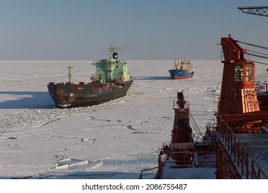 Nuclear Icebreaker Leads A Convoy Of Ships In The Arctic Ocean