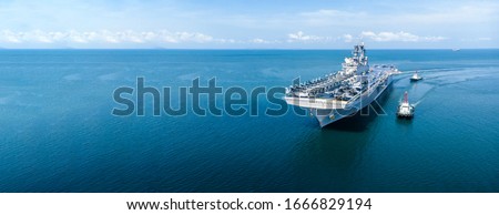 Nuclear ship, Military navy ship carrier full loading fighter jet aircraft and helicopter patrol.