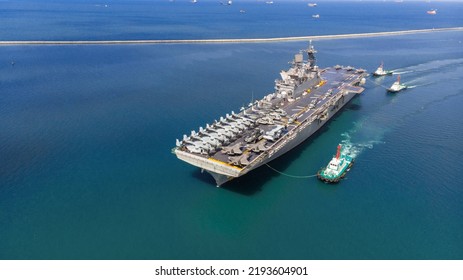 Nuclear Ship Military Navy Ship War Ship Carrier Full Loading Fighter Jet Aircraft And Helicopter Patrol. In Front Of War Ship Or Side View