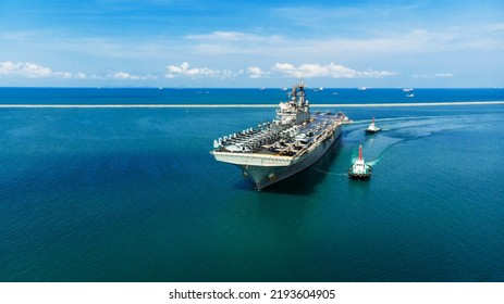 Nuclear Ship Military Navy Ship War Ship Carrier Full Loading Fighter Jet Aircraft And Helicopter Patrol. In Front Of War Ship Or Side View