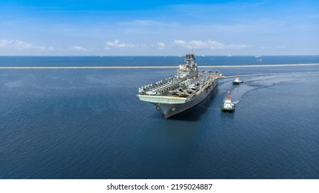 Nuclear Ship Military Navy Ship War Ship Carrier Full Loading Fighter Jet Aircraft And Helicopter Patrol. In Front Of War Ship Or Side View