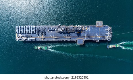 Nuclear Ship Military Navy Ship War Ship Carrier Full Loading Fighter Jet Aircraft And Helicopter Patrol. In Front Of War Ship Or Side Viewv