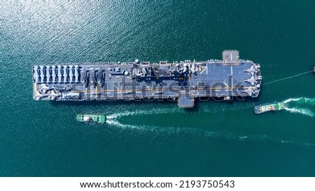 Nuclear ship Military navy ship war ship carrier full loading fighter jet aircraft and helicopter patrol. top view