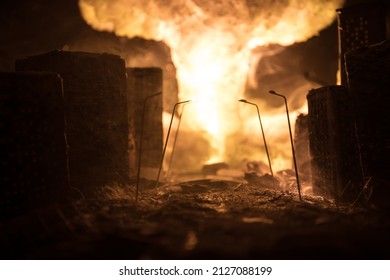 Nuclear war apocalypse concept. Explosion of nuclear bomb in city. City destroyed by atomic war. Creative artwork decoration in dark. Selective focus - Shutterstock ID 2127088199