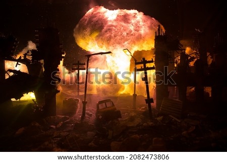 Nuclear war apocalypse concept. Explosion of nuclear bomb in city. City destroyed by atomic war. Creative artwork decoration in dark. Selective focus