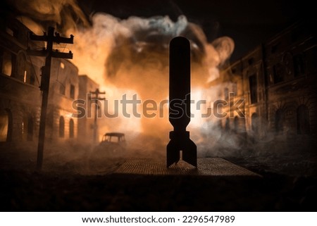 Nuclear war apocalypse concept. Explosion of nuclear bomb in city. City destroyed by atomic war. Creative artwork decoration in dark. Selective focus