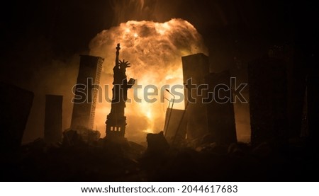 Nuclear war concept. Explosion of nuclear bomb. Apocalyptic view of city downtown after bombing. Night scene. City destroyed by war.