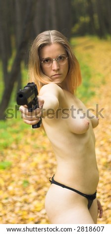 Nude Girl With Gun In The Autumn Forest Nude Girl With Gun In The Autumn Forest