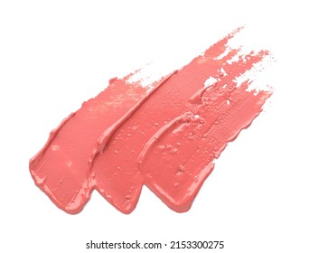 Nude liquid lipstick smears on white background
