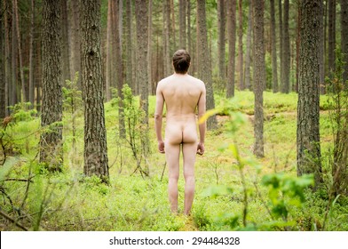 nude man in forest