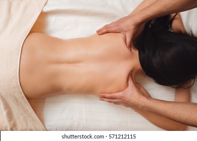 Naked Client Enjoys Relaxing Sex Massage on Table