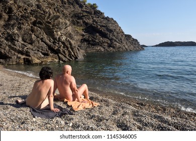 Nudist Couple On A Beach