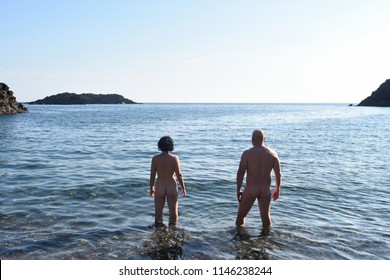 A Nudist Couple On The Beach