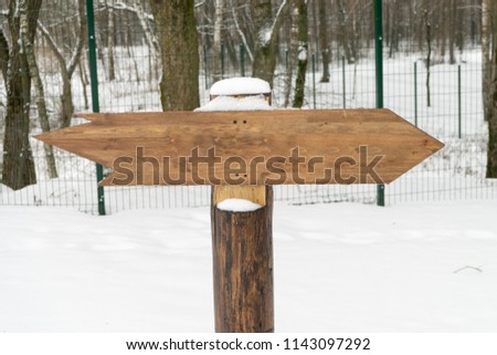 A null pointer in a forest in winter. Place for your text.