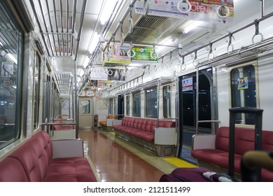 Numazu, Japan - May 2014: View Of Interior Of Empty Japanese Train Wagon Stop At Platform Of Numazu Station At Night. No People.