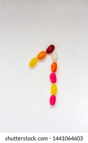 Number 1 With The One Formed Out Of Colorful Sweet Jelly Beans Centered On A White Background