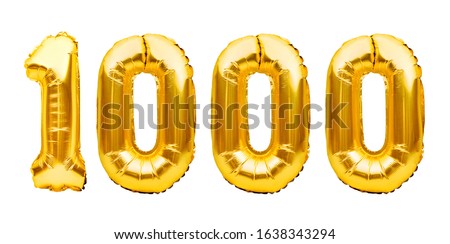 Number 1000 one thousand made of golden inflatable balloons isolated on white. Helium balloons, gold foil numbers. Party decoration, 1000 subscribers or followers and likes