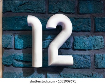 Number 12 House Number On The Wall Twelve