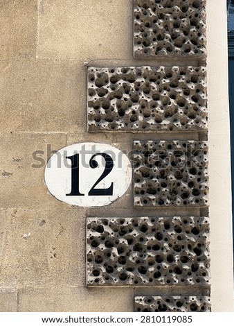 The number 12 on a wall
