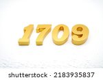  Number 1709 is made of gold painted teak, 1 cm thick, laid on a white painted aerated brick floor, visualized in 3D.                              