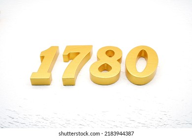   Number 1780 is made of gold painted teak, 1 cm thick, laid on a white painted aerated brick floor, visualized in 3D.                                  