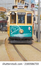The Number 18 Tram At A Stop In Porto, Portugal, Europe, Driver Wearing A Mask Due To Covid Restrictions 18 MAY 2022