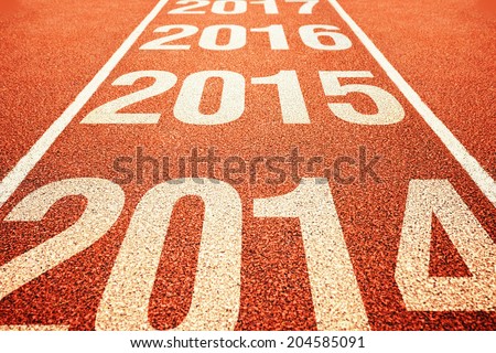 Number 2015 on athletics all weather running track withe preceeding and following years. Happy new 2015 year. Running fast towards New Year.