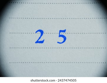 Number '25' on single line paper. Concept for year, anniversary, countdown, celebration.