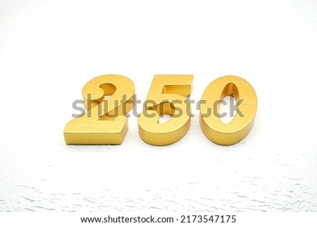   Number 250 is made of gold-plated teak, 1 cm thick, laid on a white painted aerated brick floor, giving good 3D visibility.                                      