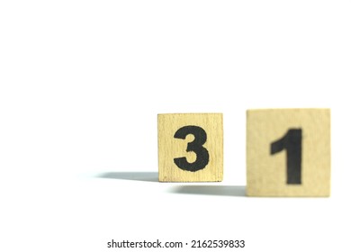 Number 31 In Wooden Cube On Plain White Background Isolated