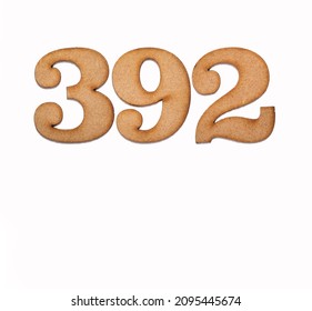 Number 392 in wood, isolated on white background